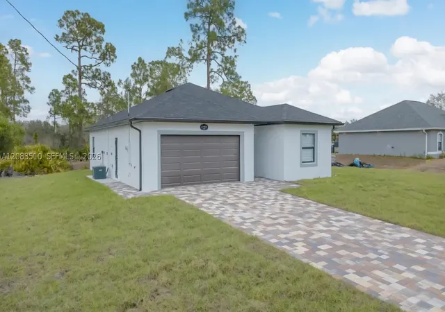 Photo 1 of Single family home for sale at 12 West 15th St, Lehigh Acres, FL 33972 | MLS# A12083510 | Listing updated on 2026-09-10