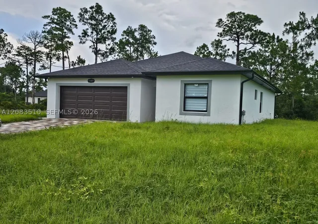 Photo 2 of Single family home for sale at 12 West 15th St, Lehigh Acres, FL 33972 | MLS# A12083510 | Listing updated on 2026-09-10