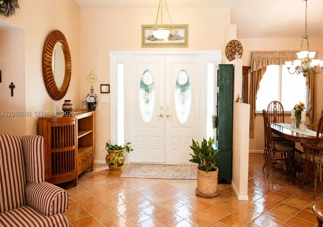 Photo 2 of Single family home for sale at 10411 Nw 48th Mnr, Coral Springs, FL 33076 | MLS# A12080400 | Listing updated on 2026-09-05