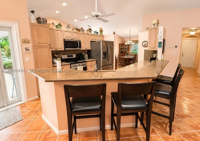 Photo 4 of Single family home for sale at 10411 NW 48th Mnr, Coral Springs, FL 33076 | MLS# A12080400 | Listing updated on 2026-09-05