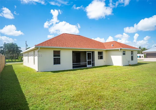 Photo 3 of Single family home for sale at 5961 NW Brenda Cir, Port St Lucie, FL 34986 | MLS# A12084237 | Listing updated on 2026-09-21