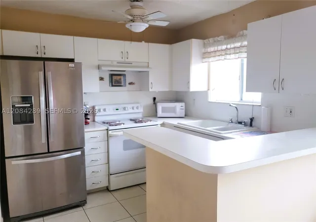 Listing Photo 4 - Condo for sale in building located at 13350 SW 152nd St, Miami, FL 33177 - Unit #2808