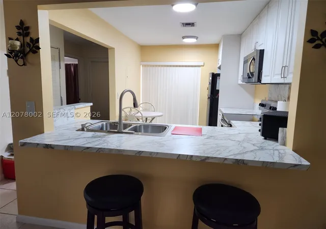 Photo 2 of Condo for sale at 416 Ponderosa #29, Fort Pierce, FL 34982 | MLS# A12078002 | Listing updated on 2026-09-06