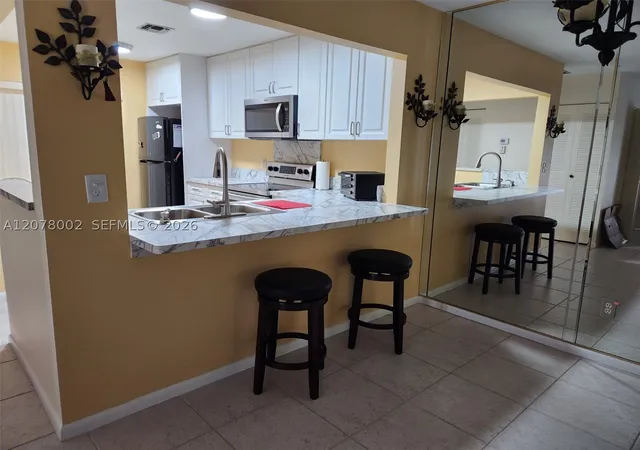 Listing Photo 4 - Condo for sale in building located at 416 Ponderosa, Fort Pierce, FL 34982 - Unit #29