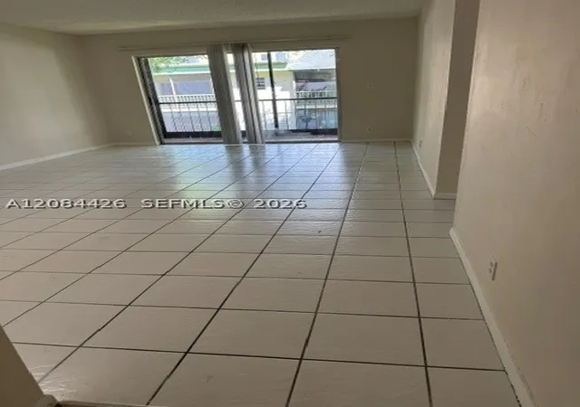 Photo 1 of Condo for sale at 4153 Nw 90th Avenue #206, Coral Springs, FL 33065 | MLS# A12084426 | Listing updated on 2026-10-01