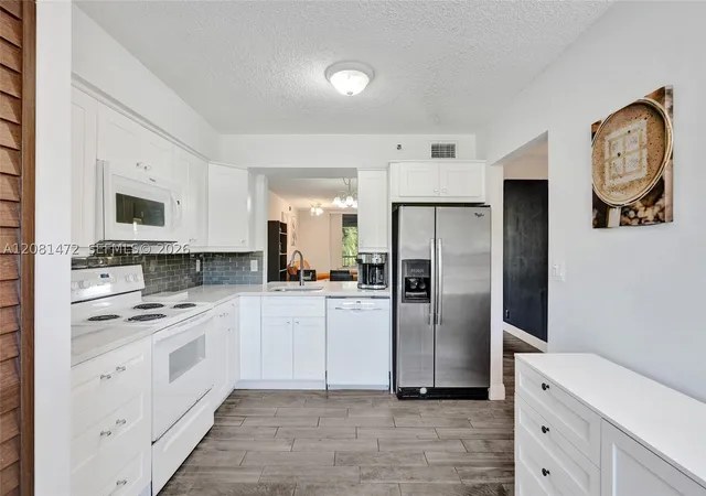 Photo 3 of Condo for sale at 4570 NW 18th Avenue #202, Deerfield Beach, FL 33064 | MLS# A12081472 | Listing updated on 2026-09-06