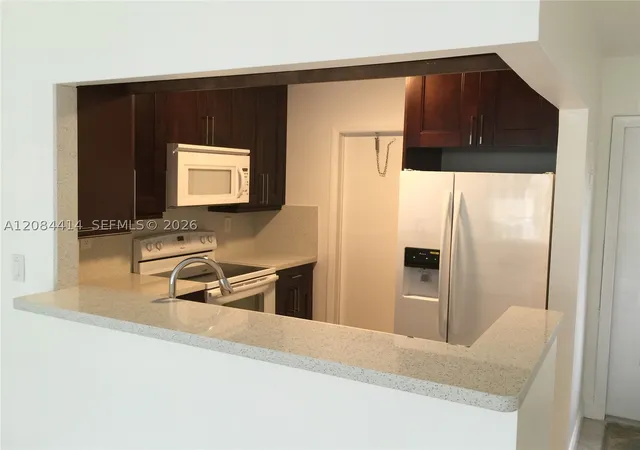Photo 4 of Condo for sale at 5051 W Oakland Park Blvd #302, Lauderdale Lakes, FL 33313 | MLS# A12084414 | Listing updated on 2026-09-07