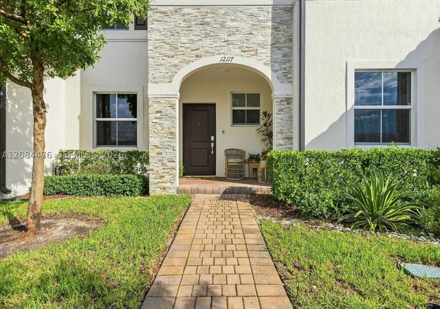 Photo 1 of Townhouse for sale at 12117 Nw 23rd Court, Miami, FL 33167 | MLS# A12084476 | Listing updated on 2026-09-10