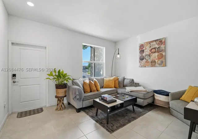 Photo 3 of Townhouse for sale at 12117 NW 23rd Court, Miami, FL 33167 | MLS# A12084476 | Listing updated on 2026-09-10