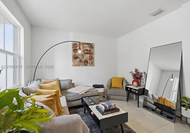 Photo 4 of Townhouse for sale at 12117 NW 23rd Court, Miami, FL 33167 | MLS# A12084476 | Listing updated on 2026-09-10