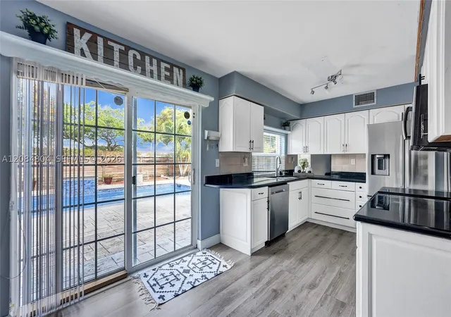Photo 4 of Single family home for sale at 3753 NW 73rd Way, Coral Springs, FL 33065 | MLS# A12084804 | Listing updated on 2026-09-13