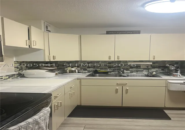 Photo 3 of Condo for sale at 1480 W 46th Street #210, Hialeah, FL 33012 | MLS# A12085041 | Listing updated on 2026-09-08