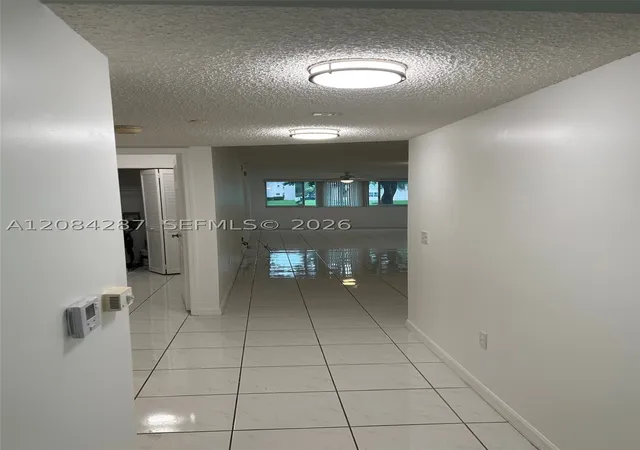 Photo 4 of Condo for sale at 2541 N Nob Hl Rd #109, Sunrise, FL 33322 | MLS# A12084287 | Listing updated on 2026-10-01