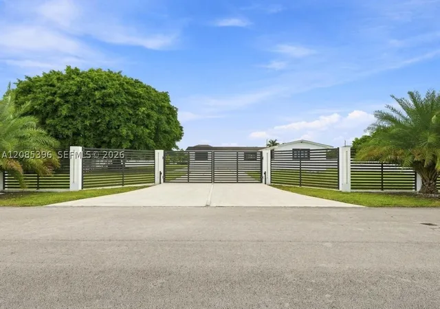 Single family home for sale at 100 NW 120th Avenue, Miami, FL 33182 | MLS# A12085396