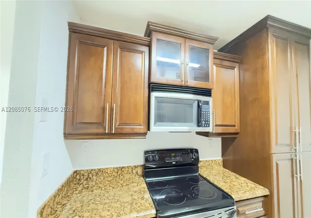 Photo 3 of Condo for sale at 7121 Miami Lakes Dr #Q8, Miami Lakes, FL 33014 | MLS# A12085076 | Listing updated on 2026-09-09