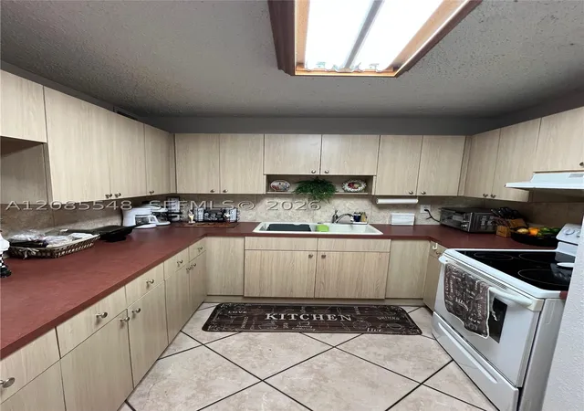 Photo 3 of Condo for sale at 1900 W 68th Street #F104, Hialeah, FL 33014 | MLS# A12085548 | Listing updated on 2026-09-29