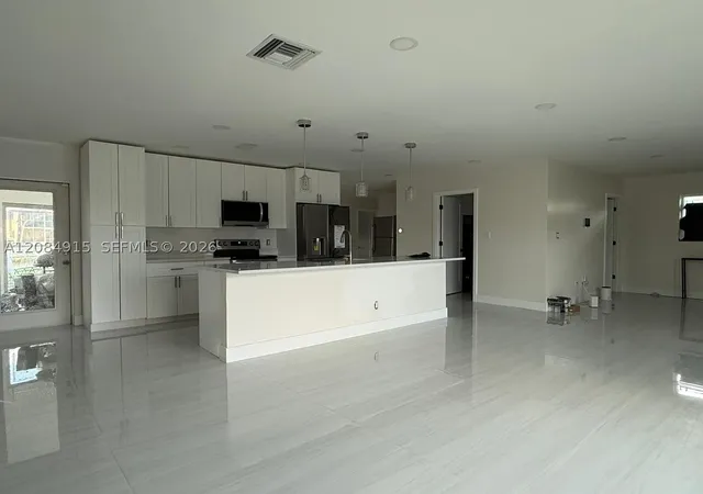 Photo 3 of Single family home for sale at 9606 Nw 80th Street, Tamarac, FL 33321 | MLS# A12084915 | Listing updated on 2026-09-11