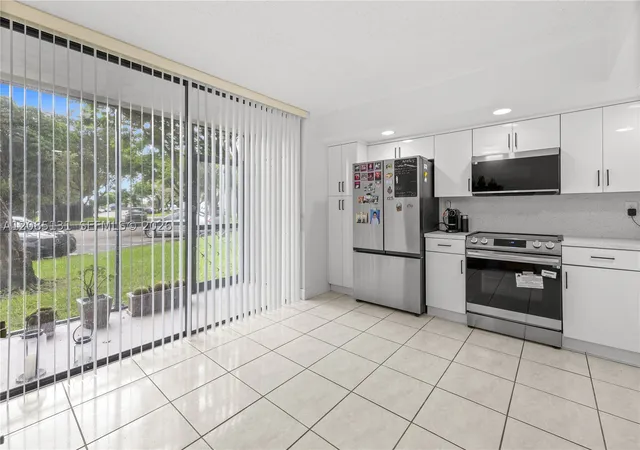 Photo 3 of Condo for sale at 8400 SW 133rd Avenue Rd #107, Miami, FL 33183 | MLS# A12085131 | Listing updated on 2026-09-09