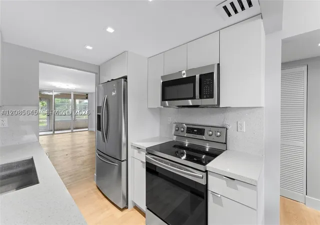 Photo 3 of Condo for sale at 3141 Nw 47th Terrace #121, Lauderdale Lakes, FL 33319 | MLS# A12085645 | Listing updated on 2026-10-06