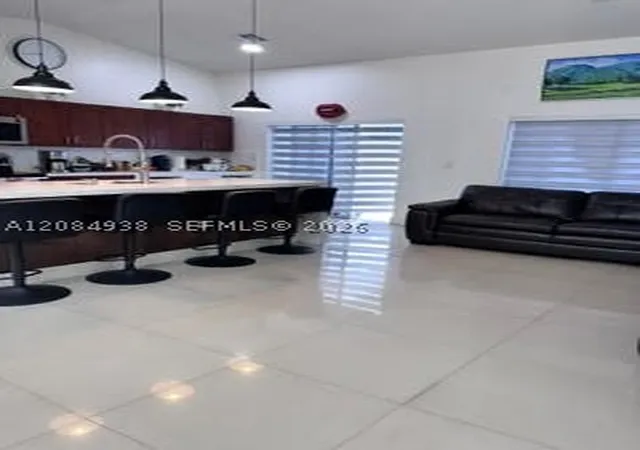 Photo 2 of House for sale at 921 NE 213th Terrace #3, Miami, FL 33179 | MLS# A12084938 | Listing updated on 2026-09-09