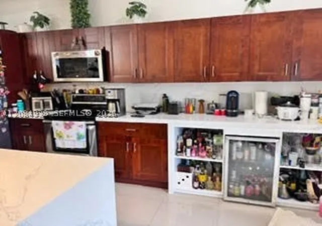 Photo 4 of House for sale at 921 NE 213th Terrace #3, Miami, FL 33179 | MLS# A12084938 | Listing updated on 2026-09-09