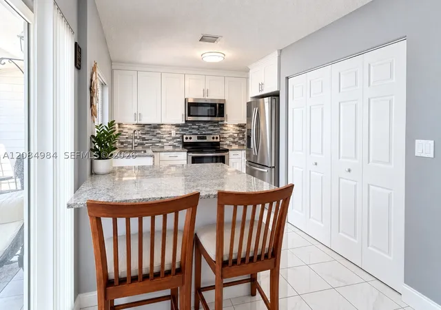 Photo 3 of Condo for sale at 13790 Sw 147th Circle Ln #3-9, Miami, FL 33186 | MLS# A12084984 | Listing updated on 2026-09-09