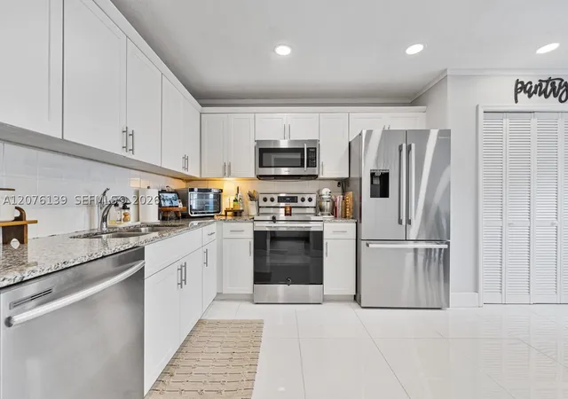 Photo 2 of Townhouse for sale at 14265 Sw 97th Terrace, Miami, FL 33186 | MLS# A12076139 | Listing updated on 2026-09-14