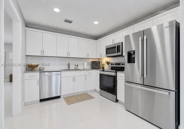 Photo 3 of Townhouse for sale at 14265 SW 97th Terrace, Miami, FL 33186 | MLS# A12076139 | Listing updated on 2026-09-14