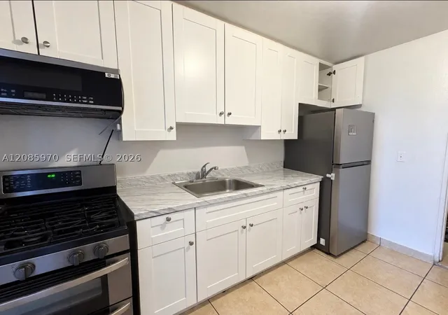 Photo 1 of Single family home for sale at 1010 E 8th Court, Hialeah, FL 33010 | MLS# A12085970 | Listing updated on 2026-10-02