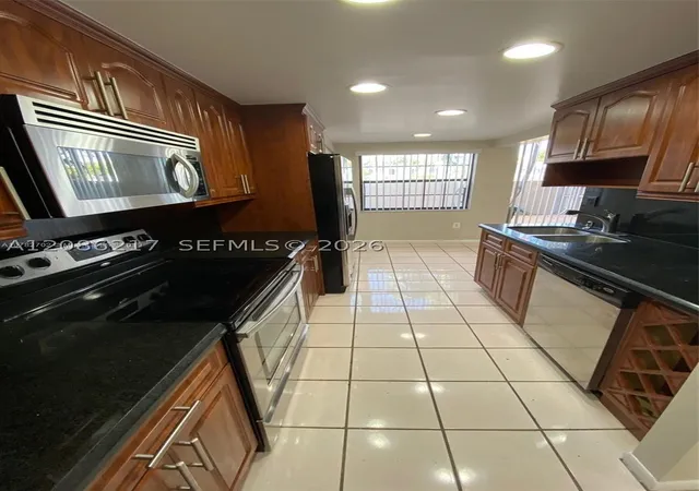 Photo 4 of Townhouse for sale at 12241 SW 16th Terrace #K105, Miami, FL 33175 | MLS# A12086217 | Listing updated on 2026-09-10