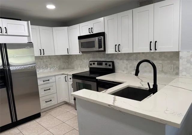 Photo 2 of Condo for sale at 1825 Palm Cvs Blvd #7-303, Delray Beach, FL 33445 | MLS# A12086061 | Listing updated on 2026-09-10
