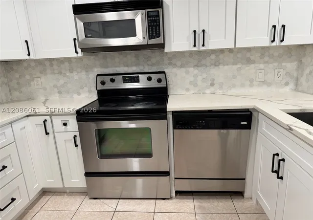 Photo 3 of Condo for sale at 1825 Palm Cvs Blvd #7-303, Delray Beach, FL 33445 | MLS# A12086061 | Listing updated on 2026-09-10