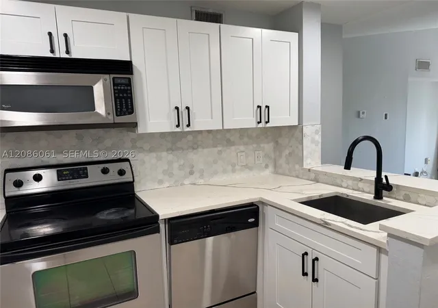Photo 3 of Condo for sale at 1825 Palm Cvs Blvd #7-303, Delray Beach, FL 33445 | MLS# A12086061 | Listing updated on 2026-09-10