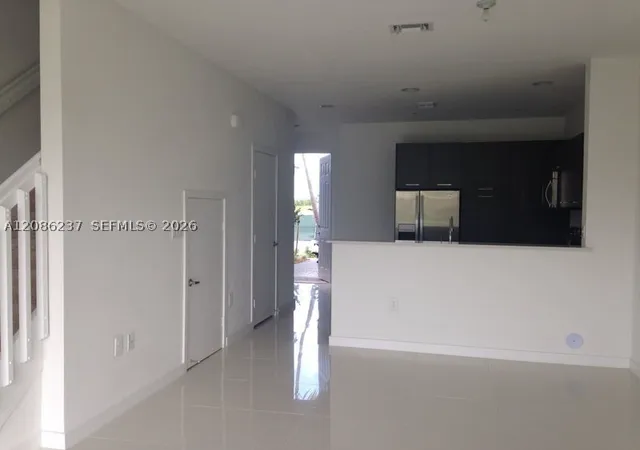 Photo 1 of Townhouse for sale at 3566 Nw 13th Street, Lauderhill, FL 33311 | MLS# A12086237 | Listing updated on 2026-09-10