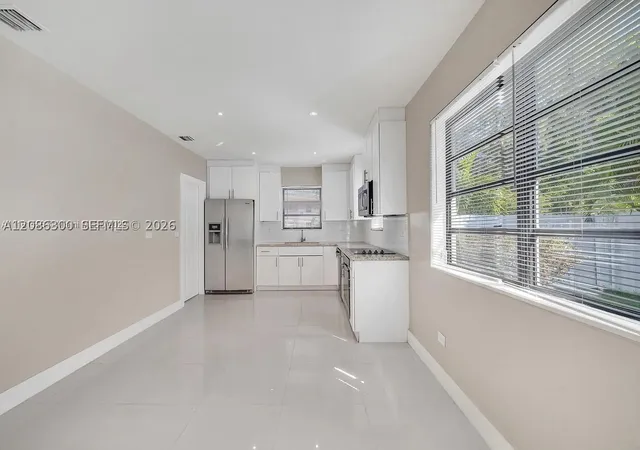 Photo 4 of Single family home for sale at 12015 NE 7th Avenue, Biscayne Park, FL 33161 | MLS# A12086300 | Listing updated on 2026-09-10