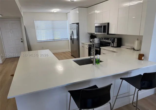 Photo 2 of Condo for sale at 2560 Nw 103rd Avenue #402, Sunrise, FL 33322 | MLS# A12086384 | Listing updated on 2026-09-10