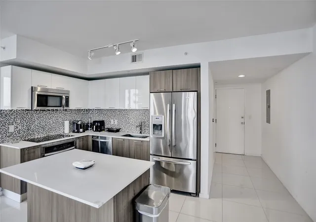 Photo 1 of Condo for sale at 5252 NW 85th Avenue #401, Doral, FL 33166 | MLS# A12086467 | Listing updated on 2026-09-10