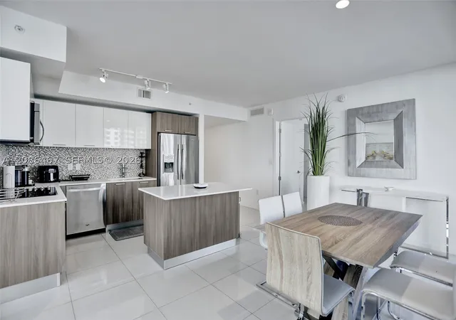 Photo 3 of Condo for sale at 5252 NW 85th Avenue #401, Doral, FL 33166 | MLS# A12086467 | Listing updated on 2026-09-10