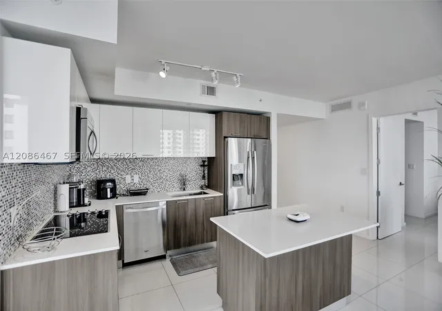 Photo 4 of Condo for sale at 5252 NW 85th Avenue #401, Doral, FL 33166 | MLS# A12086467 | Listing updated on 2026-09-10