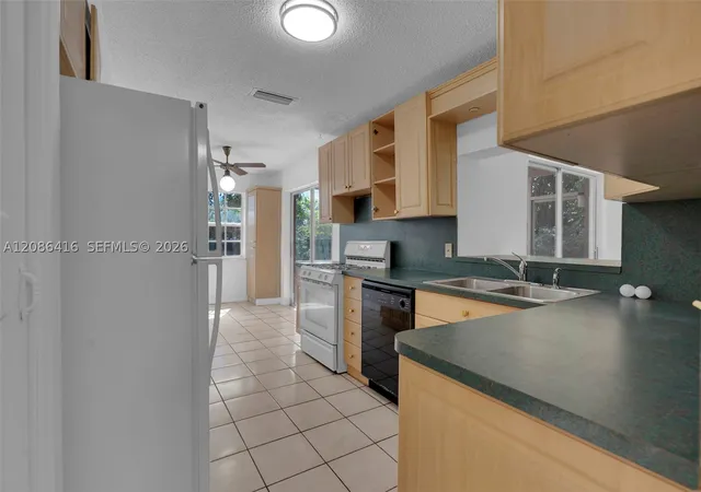 Photo 3 of Single family home for sale at 10780 NW 29th Court, Sunrise, FL 33322 | MLS# A12086416 | Listing updated on 2026-09-12