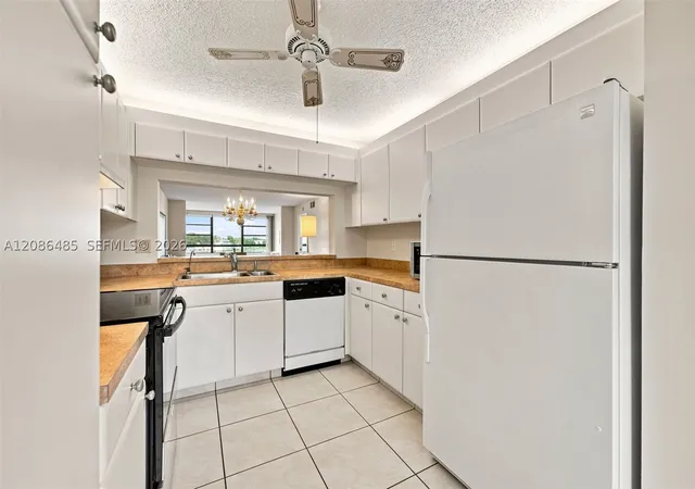Photo 2 of Condo for sale at 10668 W Clairmont Cir #303, Tamarac, FL 33321 | MLS# A12086485 | Listing updated on 2026-09-10