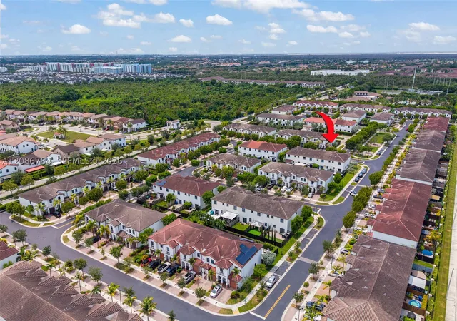 Photo 1 of Townhouse for sale at 8897 Nw 103rd Avenue, Doral, FL 33178 | MLS# A12086784 | Listing updated on 2026-09-10