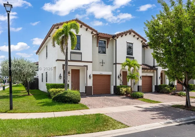 Photo 3 of Townhouse for sale at 8897 NW 103rd Avenue, Doral, FL 33178 | MLS# A12086784 | Listing updated on 2026-09-10