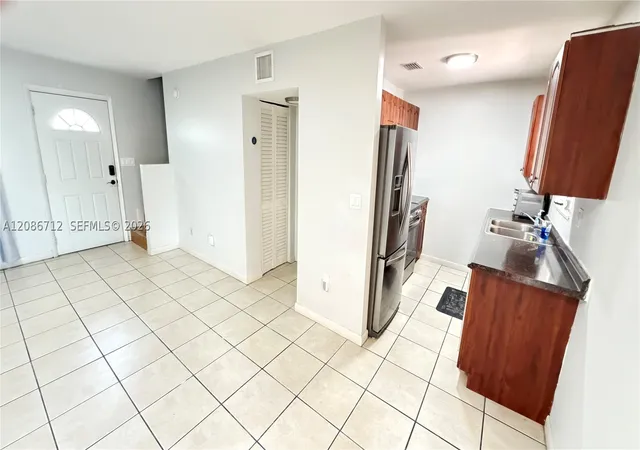 Photo 4 of Townhouse for sale at 11249 SW 33rd Circle Pl, Miami, FL 33165 | MLS# A12086712 | Listing updated on 2026-09-10