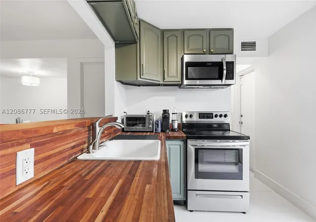 Photo 3 of Townhouse for sale at 8823 NE 4th Avenue Rd #8823, Miami Shores, FL 33138 | MLS# A12086777 | Listing updated on 2026-09-10