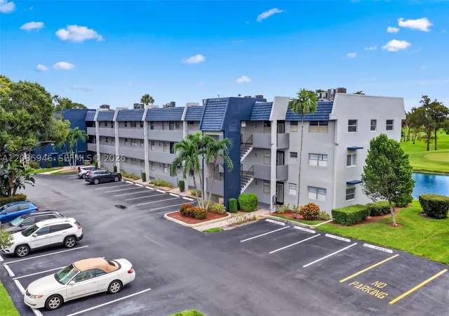 Listing Photo 1 - Condo for sale in building located at 7807 Golf Cir Dr, Margate, FL 33063 - Unit #104