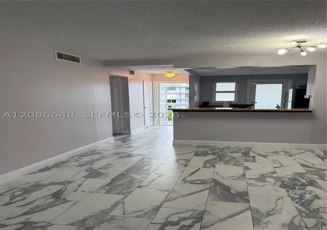 Photo 1 of Condo for sale at 320 NE 12th Avenue #506, Hallandale Beach, FL 33009 | MLS# A12086648 | Listing updated on 2026-09-26