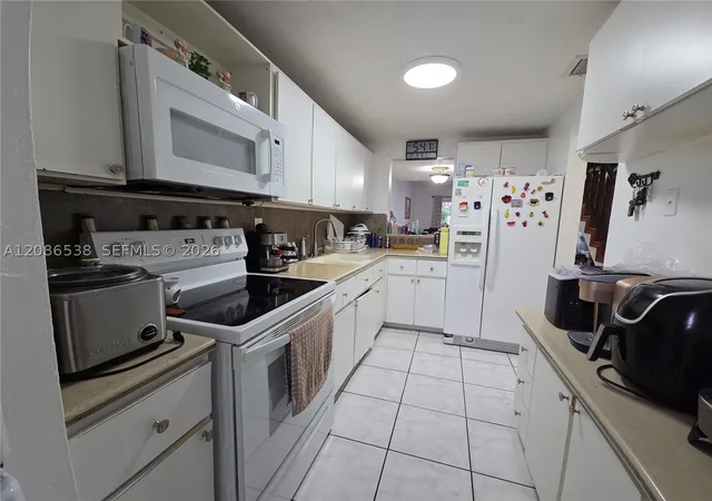 Photo 1 of Condo for sale at 1784 W 56th Terrace #401, Hialeah, FL 33012 | MLS# A12086538 | Listing updated on 2026-09-13