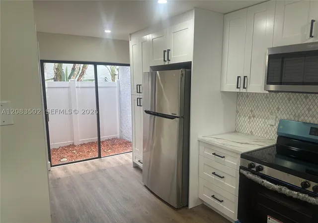 Photo 3 of Townhouse for sale at 2643 42nd Ave, Coconut Creek, FL 33066 | MLS# A12083502 | Listing updated on 2026-09-12