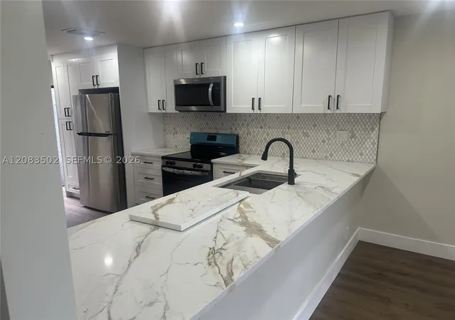 Photo 4 of Townhouse for sale at 2643 42nd Ave, Coconut Creek, FL 33066 | MLS# A12083502 | Listing updated on 2026-09-12
